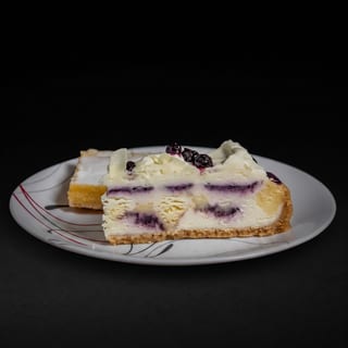 Blueberry Cobbler White Chocolate Cheesecake Slice